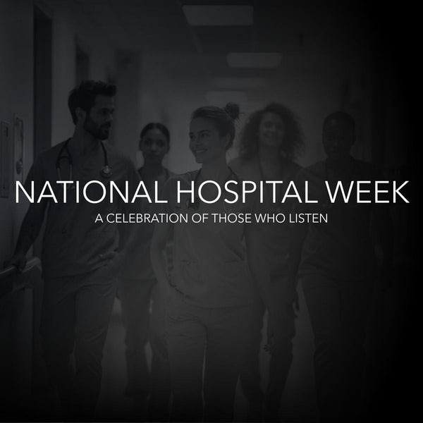 National Hospital Week banner with diverse medical staff walking in hospital hallway