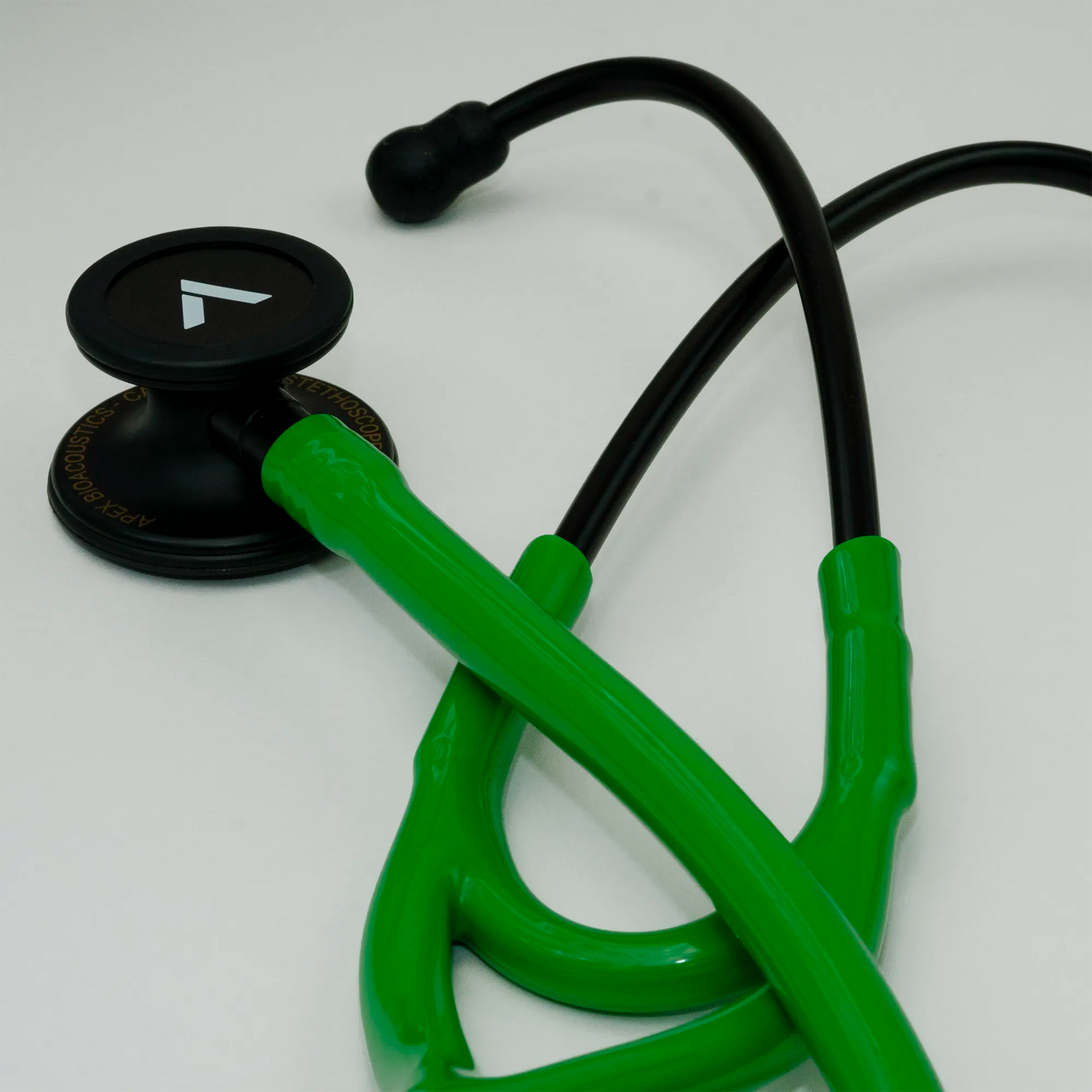  a green cardiology stethoscope with ear tips
