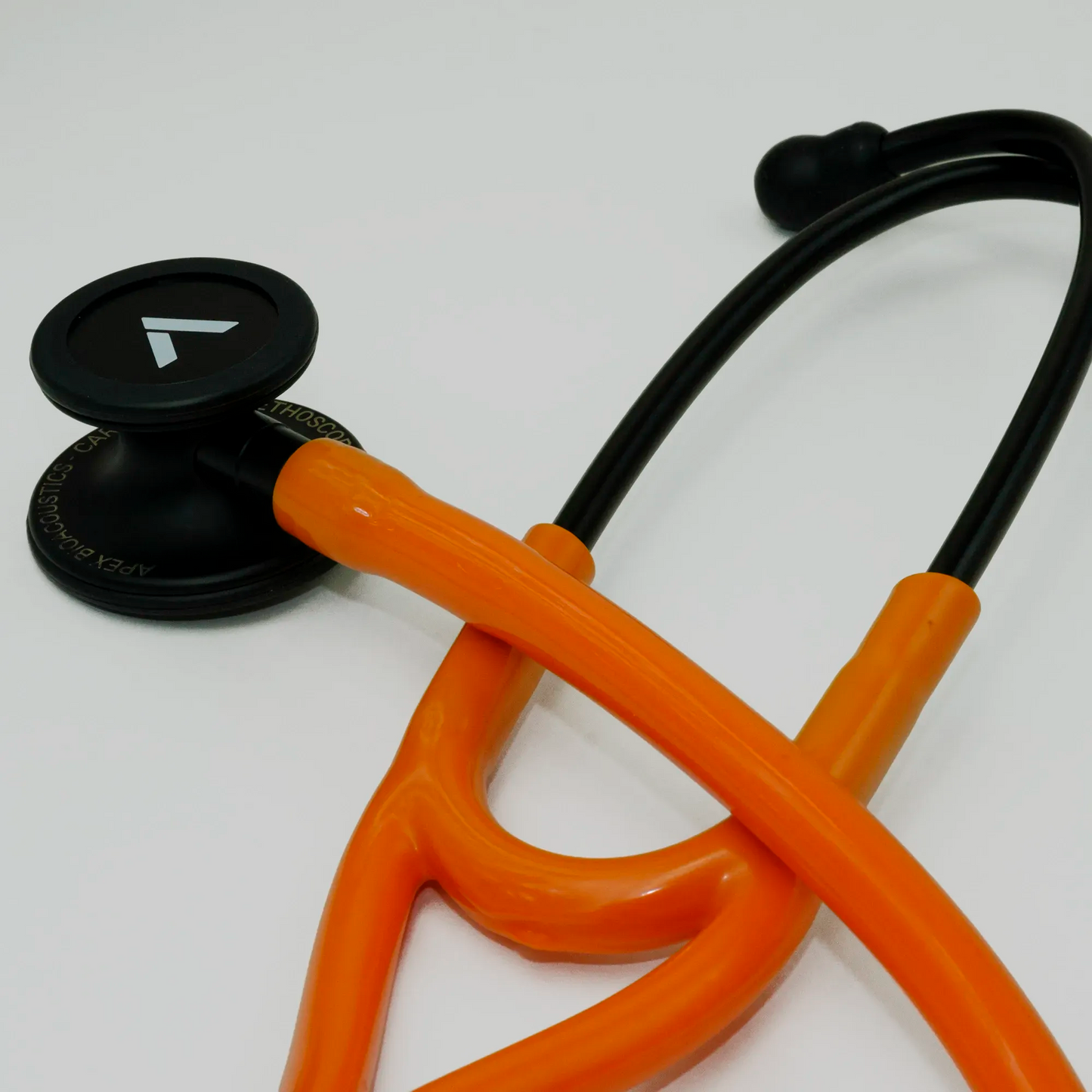 orange cardiology stethoscope with ear tips