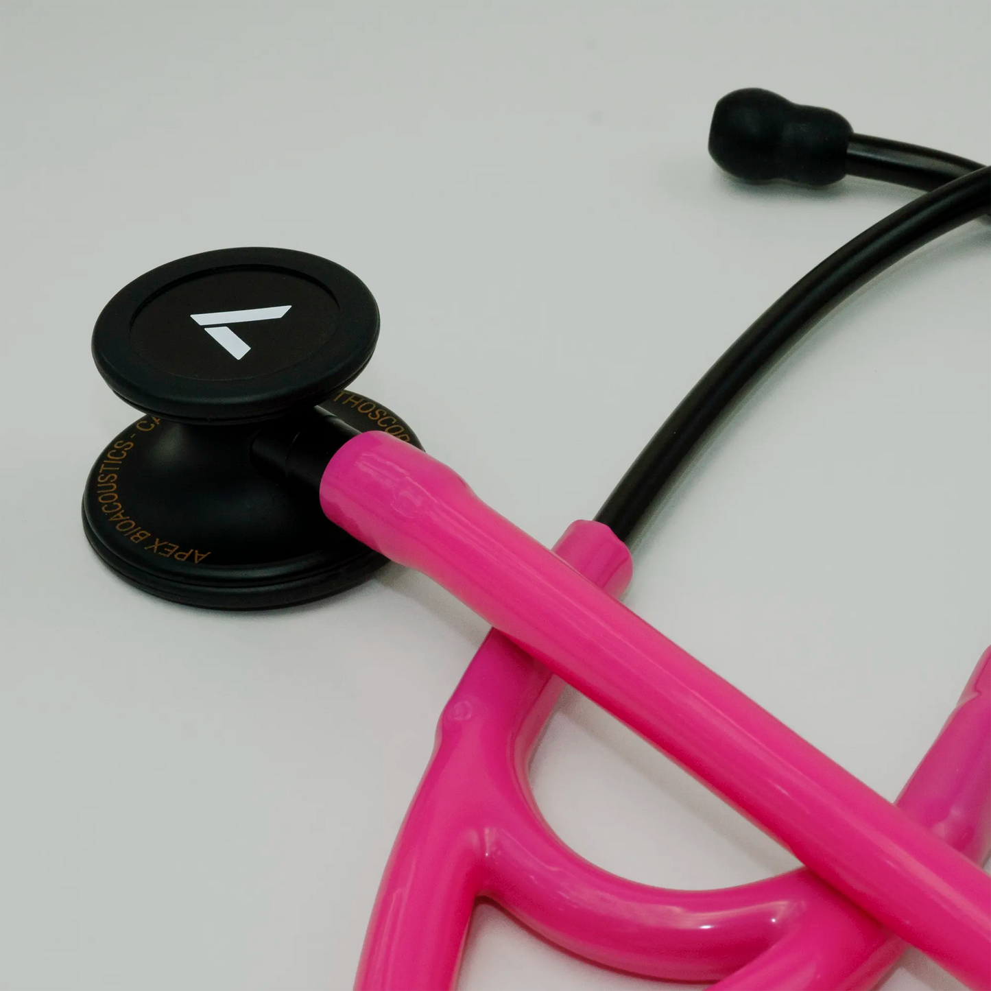  a pink cardiology stethoscope with ear tips