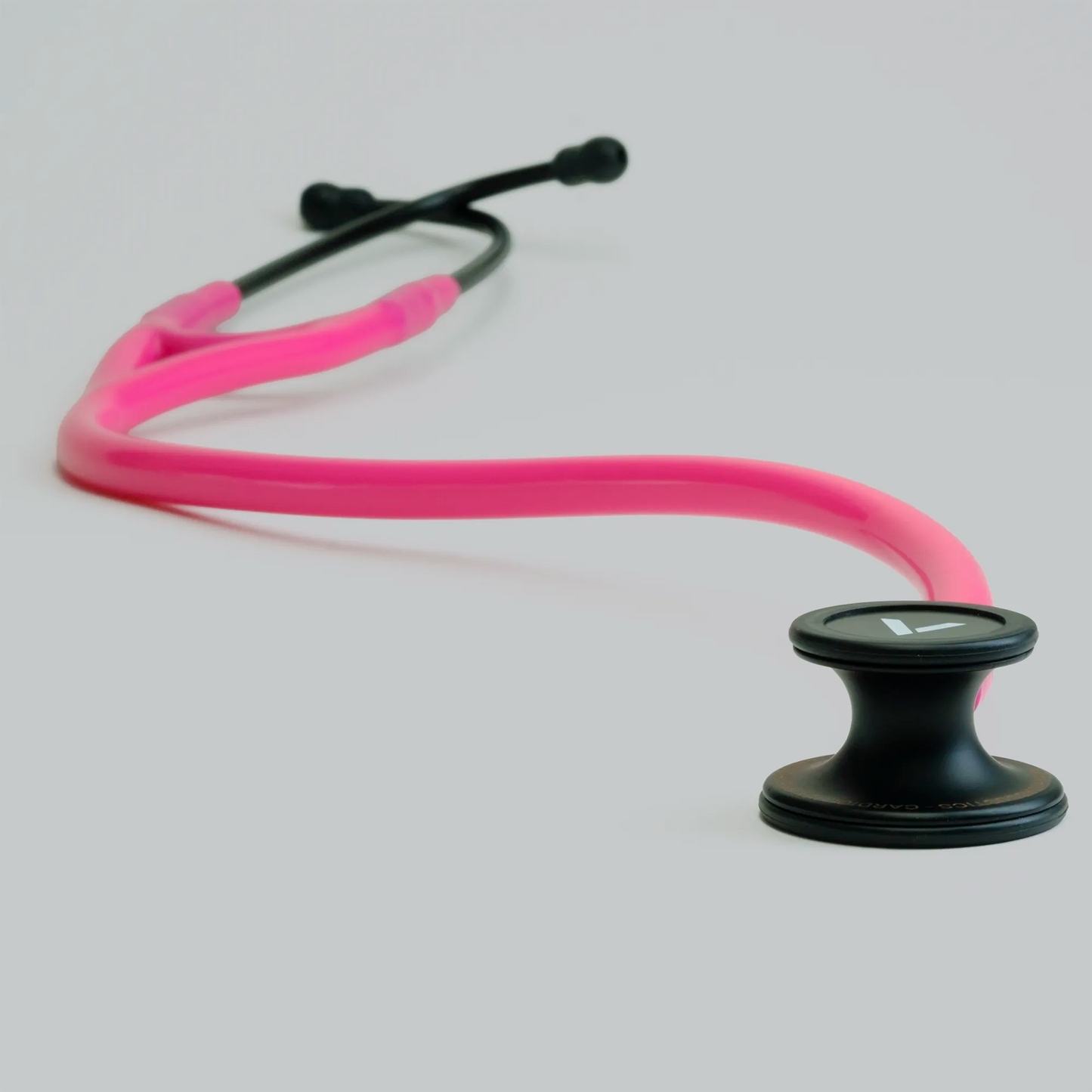  a long pink cardiology stethoscope