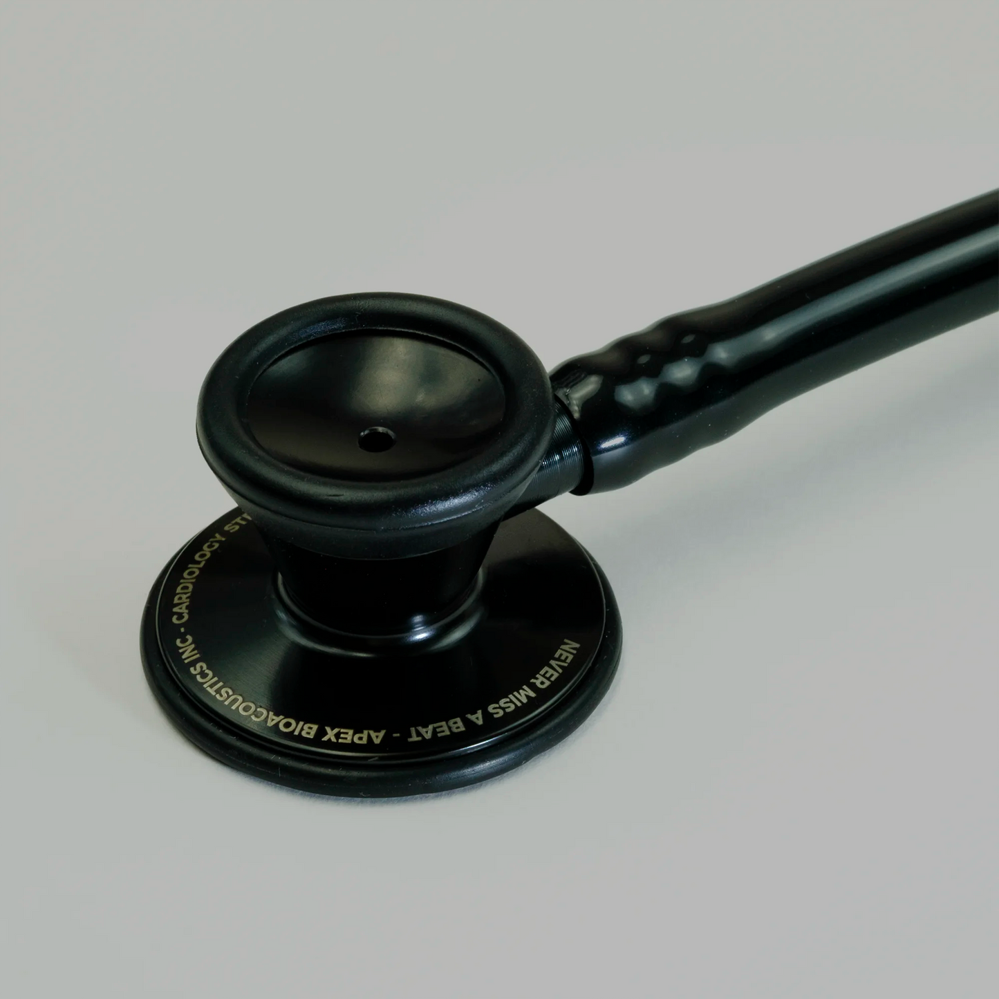 black cardiology stethoscope chest piece