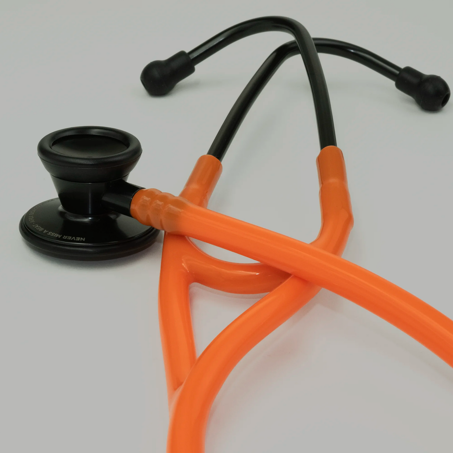 stethoscope and tubing orange cardiology stethoscope
