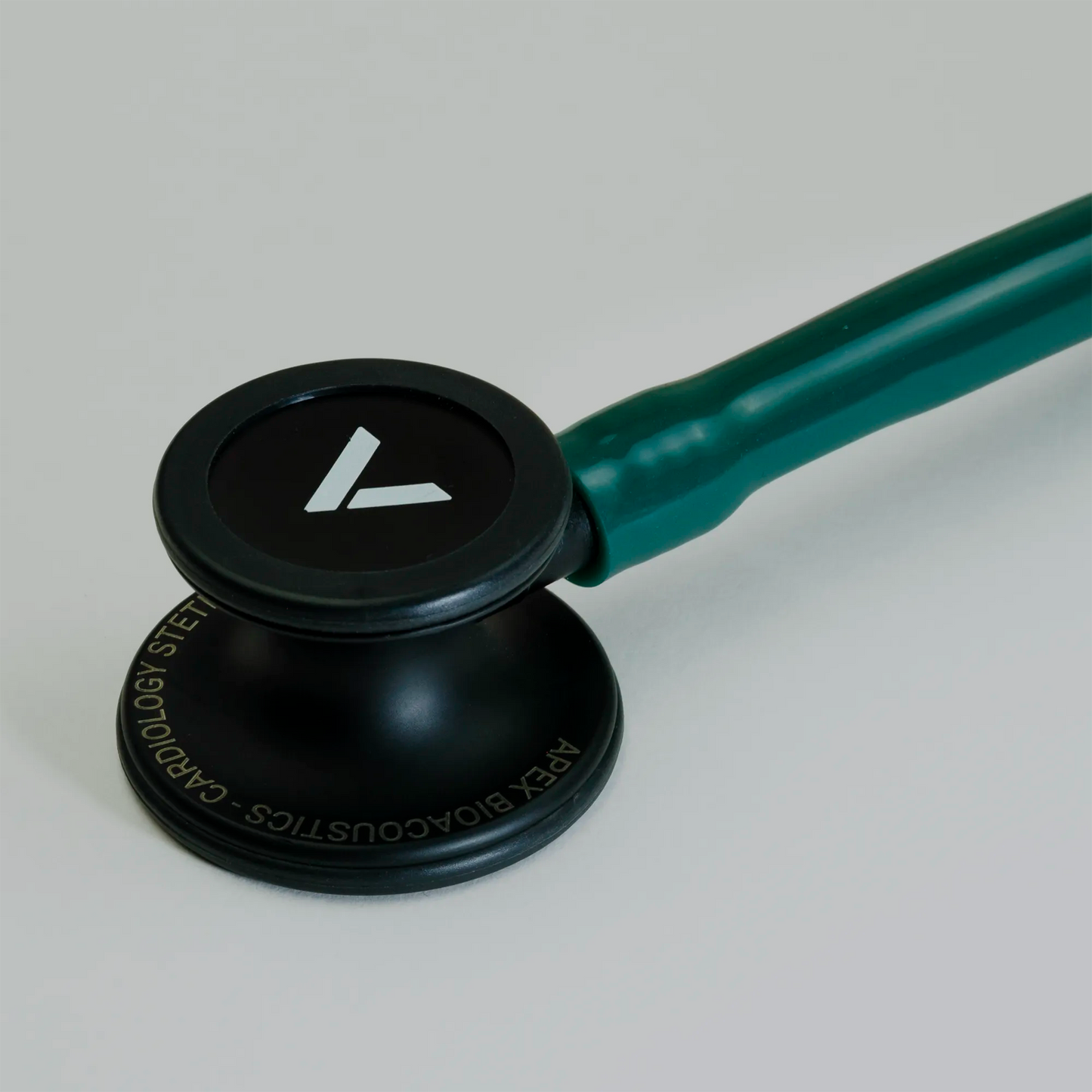  a teal cardiology stethoscope chest piece